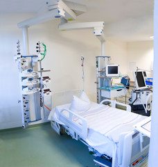 Intensive care unit with monitors prepared to receive corona, covid patient