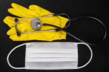 Hygiene mask for protection, gloves and stethoscope. Accessories for doctors and patients for...