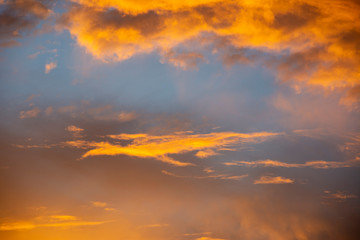 Golden Clouds during sunset with different forms