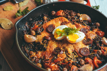 Delicious plate of vegetables with meat and egg