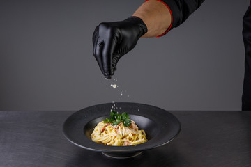 the process of cooking noodles with meat and vegetables in the restaurant kitchen22