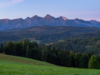 View over Tatra Mountains from Lapszanka pass, during the sunrise. Poland