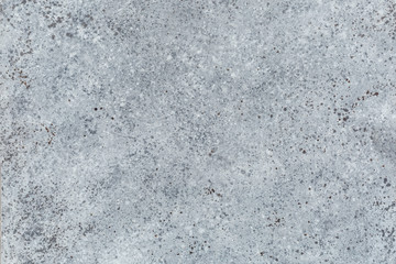 texture of an old stone interspersed with spray brushes in cold colors