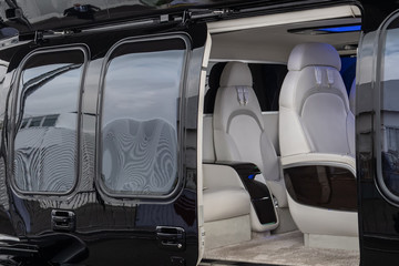 Helicopter passenger leather seats. Interior of luxury helicopter.
