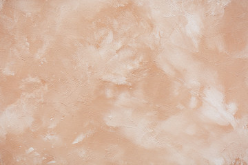 Beige plastered wall covered with fresh primer texture background
