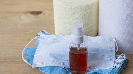 Naklejka premium Coronavirus prophylaxis. Masks protective against the corona of the virus. Coronavirus. corona virus. COVID-19. hand sanitizer. Hand hygiene. Toilet paper. Copyspace