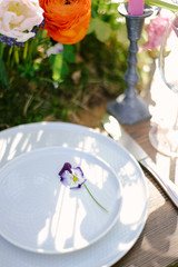Table setting at a luxury wedding and Beautiful flowers on the table.