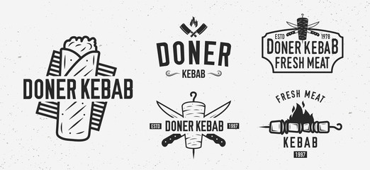 Vector Doner Kebab logo set. 5 Vintage Kebab restaurants emblems. Fast food labels, emblems, logo. Kebab, meat store, restaurant, kebab cafe. Shashlik Logo template. - obrazy, fototapety, plakaty