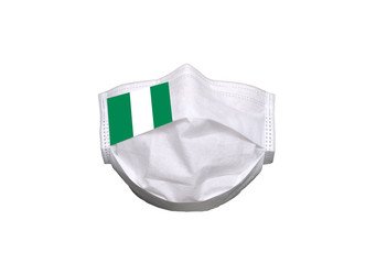 Nigeria flag on medical mask isolated on a white background. Healthcare and medical concept. Pandemic virus COVID-19