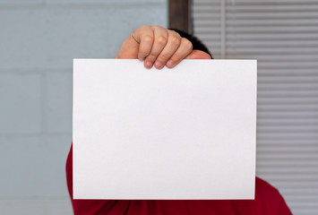 businessman holding blank paper