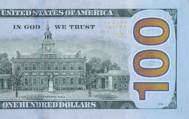 Independence Hall on 100 dollars banknote back side closeup macro fragment. United states hundred...
