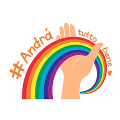 Hand hold rainbow for hope and wish. italian slogan: Andra tutto bene. Everything will be fine written in Italian. Motivational phrase in Italian used during quarantine in fighting with COVID-19