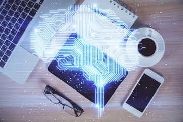 Double exposure of brain drawing over work table desktop. Top view. Global data analysis concept.