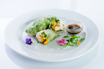 vegetable spring rolls decorated with flowers