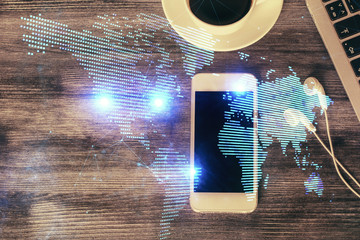 Double exposure of social network theme drawing over table with phone. Top view. People connecting concept.