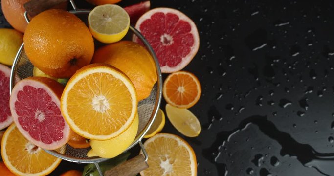 Various types of citrus in the colander to slowly rotate.