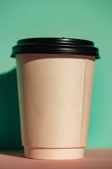 Man hand coffee cup. Coffee time. Hand. Man. Good morning. Background. Drink. Plastic. Cafe.
