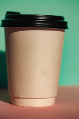 Man hand coffee cup. Coffee time. Hand. Man. Good morning. Background. Drink. Plastic. Cafe.