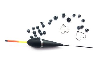 Fishing float, weights and hooks isolated on a white background. Set of fishing bobbers, weights and hooks. Set of weights for spinning. Kit of tools for professional fishing.
