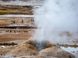 Beautiful landscape of geysers of El Tatio in winter and snowy.