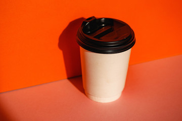 Man hand coffee cup. Coffee time. Hand. Man. Good morning. Background. Drink. Plastic. Cafe.