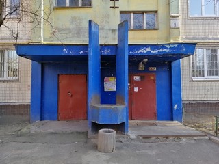 Entrance to the staircase in the old Soviet multisrorey dirt panel abandoned house.