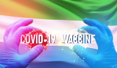 Naklejka premium COVID-19 vaccine medical concept with flag of Sierra Leone. Pandemic 3D illustration.