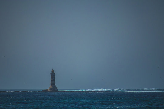 Light house at the westernmost part of mainland africa, on the peninsula of Almadies close to Yoff in Dakar, on a hazy hot day.