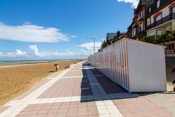Empty beach booths on the beach in France