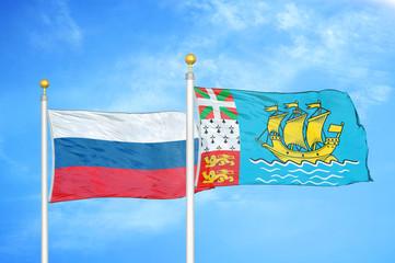 Russia and Saint Pierre and Miquelon two flags on flagpoles and blue cloudy sky
