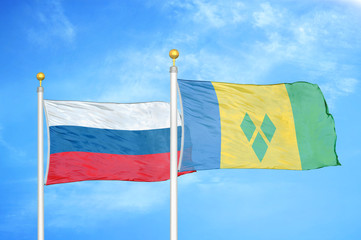 Russia and Saint Vincent and the Grenadines two two flags on flagpoles