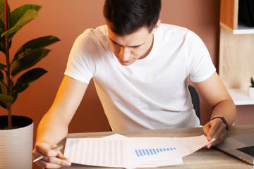 Successful businessman working in the office at computer