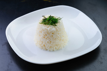 portion of rice on a white plate