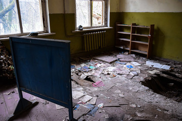 Room evacuated place torn pieces of paper lying on the floor