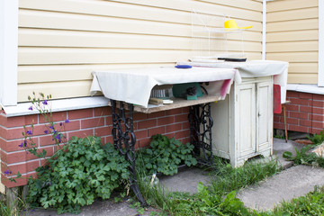 Home-made place in the courtyard of a country house for washing dishes and cooking