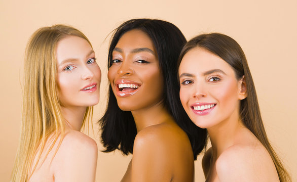 Skin tone. Multi-ethnic beauty. Different ethnicity women - Caucasian, African, Asian. Beauty. Smiling womans with perfect face skin and natural makeup portrait. different types of skin.