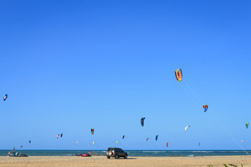 Kite surfers on the beach