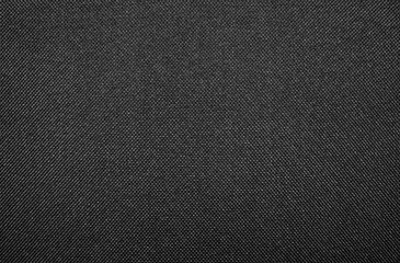 Texture of dense black fabric.Dark diamond-shaped background fabric.Black braided texture.
