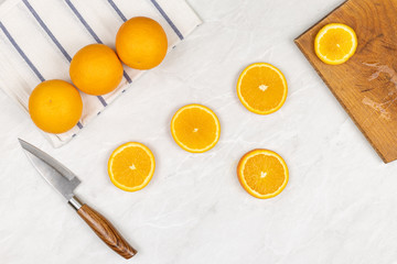 Top view of sliced orange on the white background