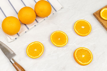 Top view of sliced orange on the white background