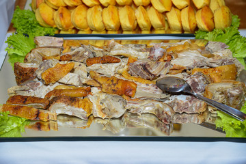 Roasted Piglet,  Corn Muffin And Stuffed Buns