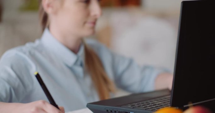 architect working on laptop at home
