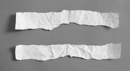torn paper on gray background with copy space for text