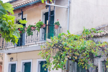 Fototapeta na wymiar Corfu island cosy streets, towns, architecture, buildings, landmarks, vegetation, historical heritage, Greece