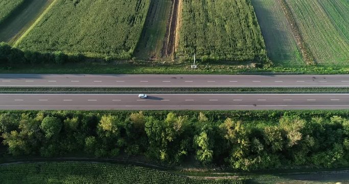 Auto Long distance route. Movement of cars. Sunny summer day