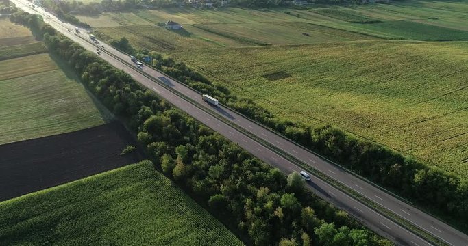 Auto Long distance route. Movement of cars. Sunny summer day