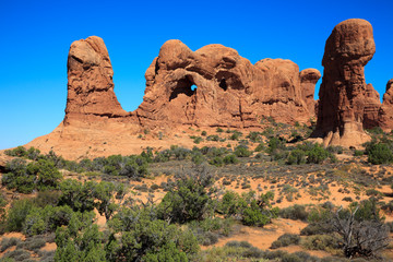 Fototapeta premium Moab, Utah / USA - August 18, 2015: Rock formation and landscape at Arches National Park, Moab, Utah, USA