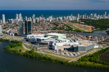 Fototapeta na wymiar Recife city, Pernambuco, Brazil on March 1, 2014. Modern buildings in the Boa Viagem neighborhood with the beach in the background. Aerial view