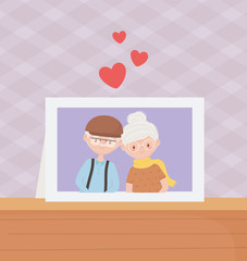 old people, cute couple grandparents photo frame in table
