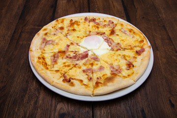 Classic Italian pizza on a wooden table